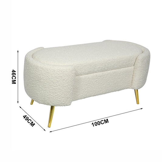 ספסל Haven מזווית צד המציג את מבנה הריפוד הרך מבד בוקלה והבסיס היציב מזהב מט.