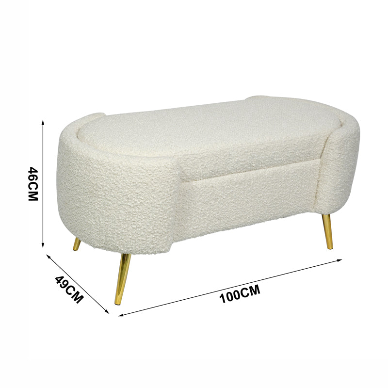 ספסל Haven מזווית צד המציג את מבנה הריפוד הרך מבד בוקלה והבסיס היציב מזהב מט.