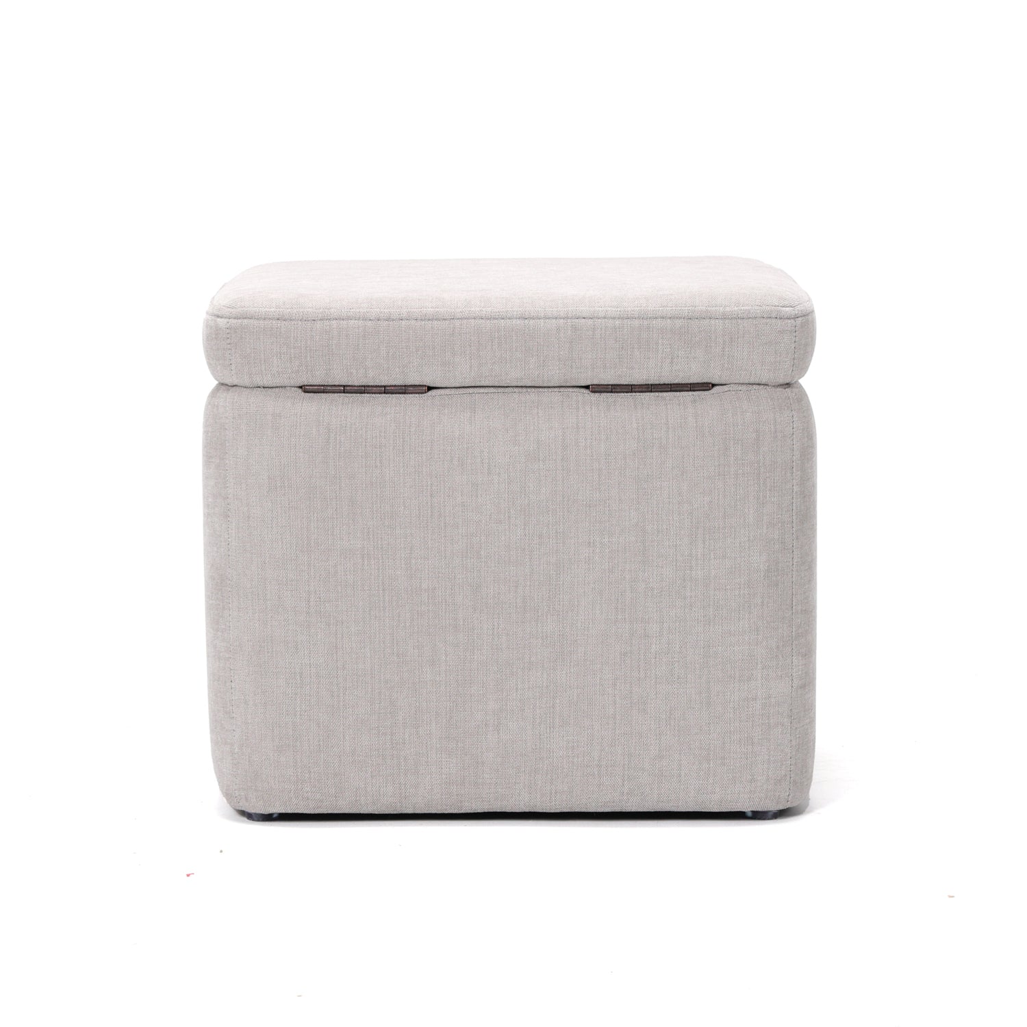 הדום Nest בגוון אפור בהיר בחלל סלון מעוצב – פתרון אחסון חכם בעיצוב יוקרתי ומינימליסטי.