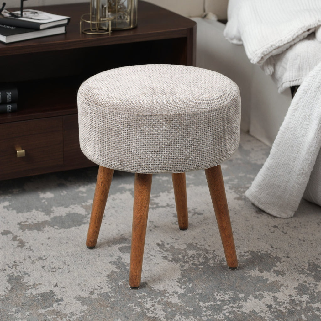 הדום Sona מבד טבעי בגוון בז’ ליד שידת עץ